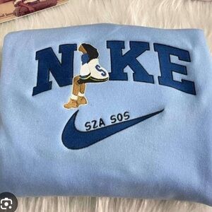SZA vintage retro style Nike embroidered baby blue crew neck